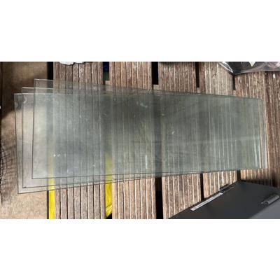 Drie glasplanken met beugels