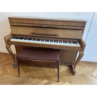 Piano met kruk