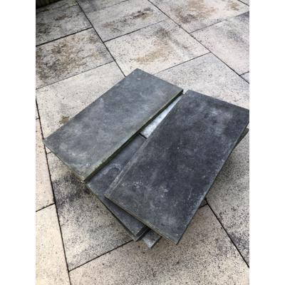 Natuurstenen tuintegels en opsluitbanden