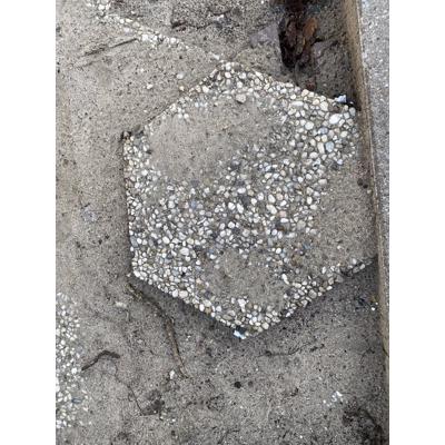 Grint tegels voor in de tuin