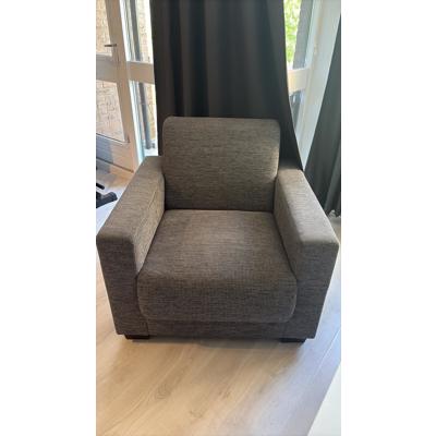 Grijze fauteuil