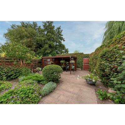 Tuinhuisje/schuurtje met veranda