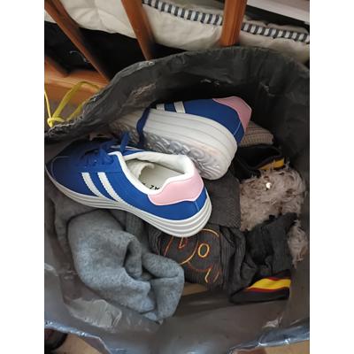 Bag of women's clothing and some shoes