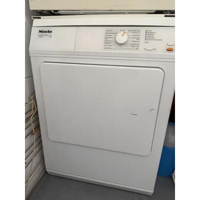 Wasdroger met luchtafvoerslang