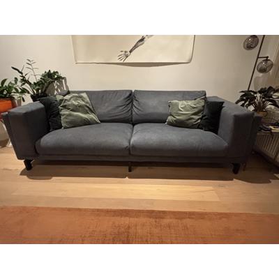 Driezits bank met net nieuwe hoezen