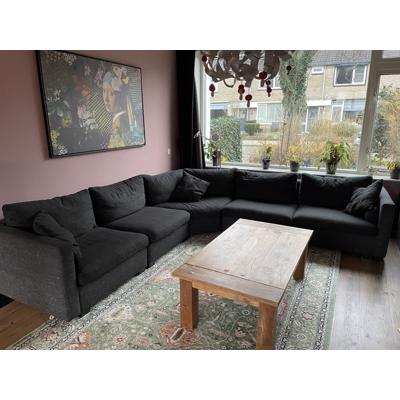 Grijze hoekbank van Montel inclusief hocker