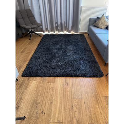 Groter donkerblauw groot vloerkleed