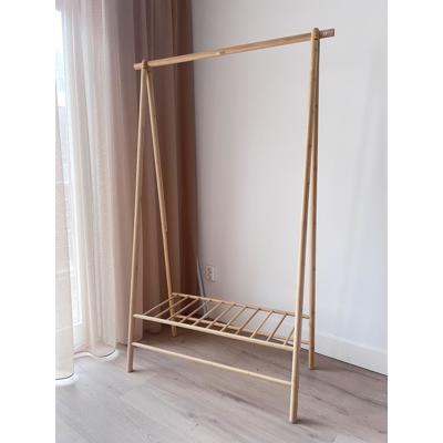 Elegant clothing rack in light bamboo