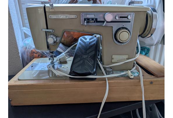 Naaimachine - PXL_20260225_145008897-RAW-01-COVER