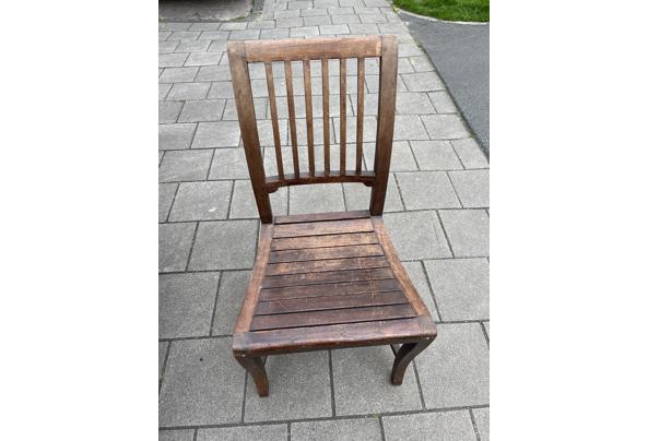 2 houten eettafel stoelen - 2E80035C-419F-4622-9621-E0513666047C