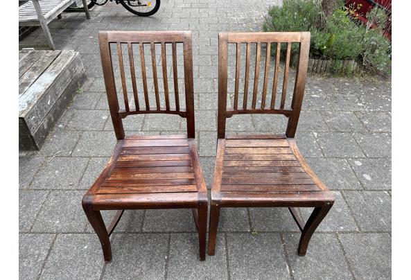2 houten eettafel stoelen - E6555AE6-AF20-46AF-8FD4-A21682412C16