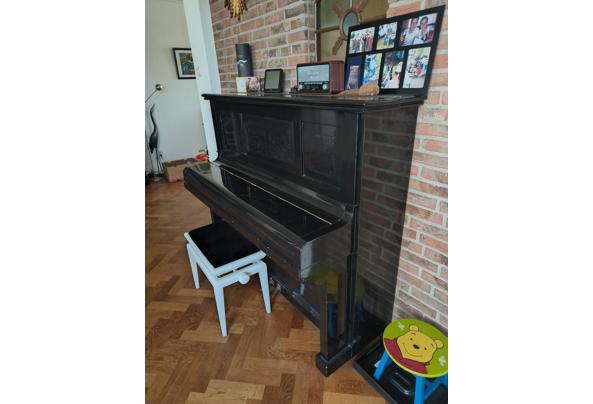 een mooie zwarte piano - IMG20240717134453