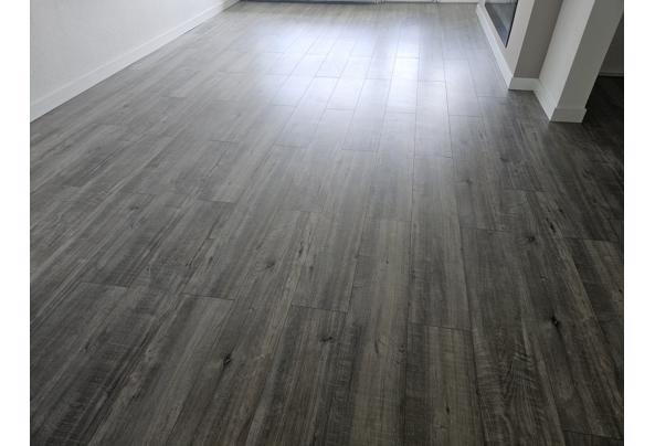 Laminaat houtkleur, ong 40m2 - 20260510_150548