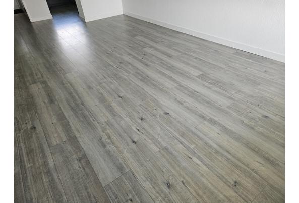 Laminaat houtkleur, ong 40m2 - 20260510_150601
