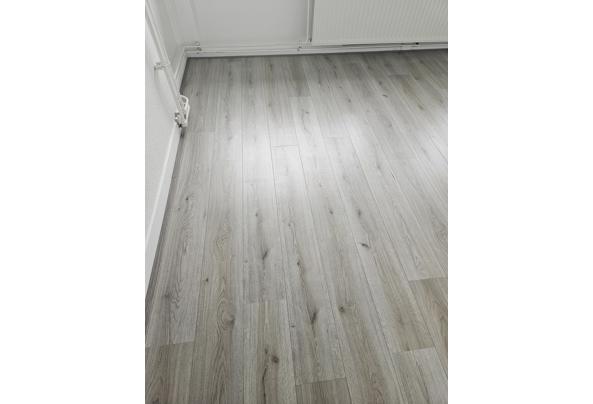 Laminaat houtkleur, ong 40m2 - 20260511_124001