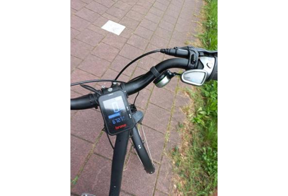 Elektrische damesfiets in prima staat, inclusief accu en oplader. - Schermpje-3