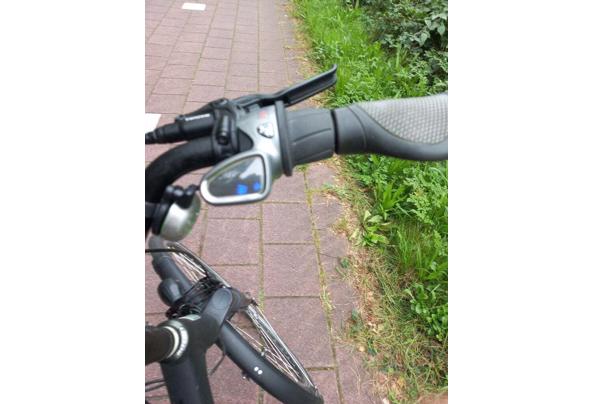 Elektrische damesfiets in prima staat, inclusief accu en oplader. - Versnelling-4