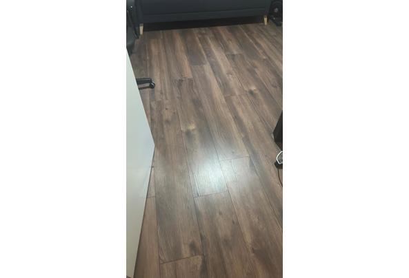 Donkereiken laminaat vloer 40m2 - dca15865-8c45-4d0b-acc0-e8c7ea236dd1