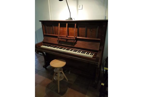 Een antieke piano zoekt een nieuw huis - piano1