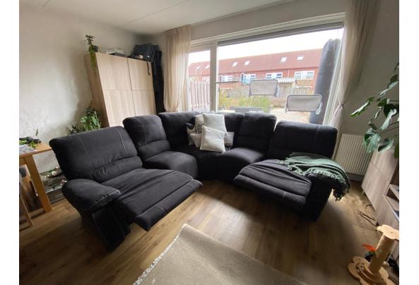 GRIJZE HOEKBANK met 2 uitklapbare relaxdelen bij de buitenste stoelen - 94658914-96e0-4d0a-b073-22cadafebe07