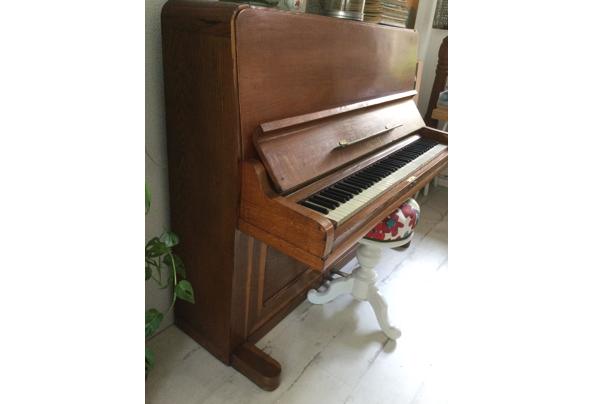 Mooie oude piano - D739364E-C370-4168-826C-F9AB898A4098