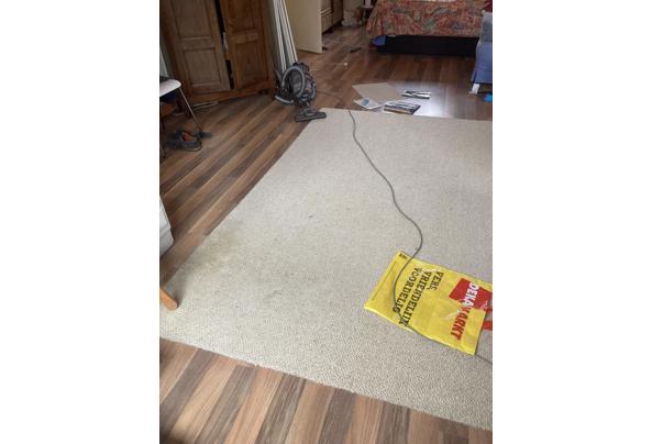 Ca 35 m2 laminaat lichtbruin - IMG_2390