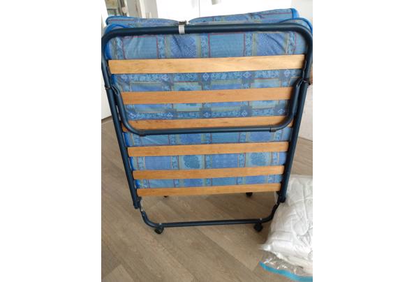 Opklapbaar vouwbed op wieltjes - vouwbed-1