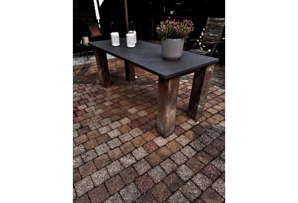 Zware tuintafel met leistenen blad - e32a39be-5f4a-43cb-abba-37de79f535bb