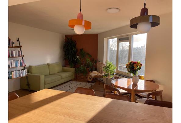 Lichtgroene bank - 4ca8a8a7-db8a-44bc-8121-be1b8605d983