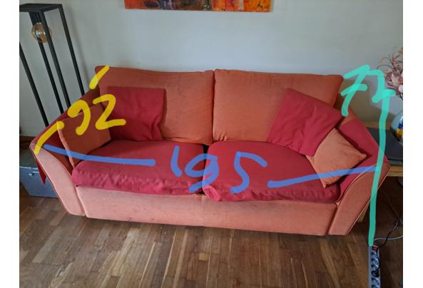 Oranje en rode bedbank. Zit nog lekker bed is makkelijk uitklapbaar - 20260209_130237