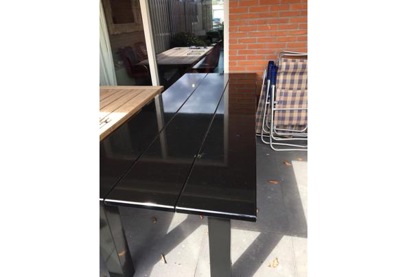 Zwarte houten tafel 230 bij 90 cm - 7BB22722-B885-4479-AC34-009A4D7A7D66
