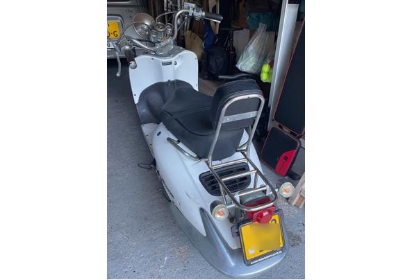 Gratis af te halen voor sleutelaar - ScooterAchter