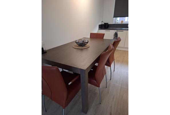 Eettafel met 4 stoelen en bijbehorende salontafel - 20260330_193432