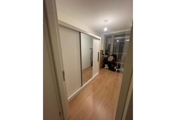 Witte kledingkast met schuifdeuren - bf2a8e2b-5fa8-4aad-84dd-db6b02c2bcc4