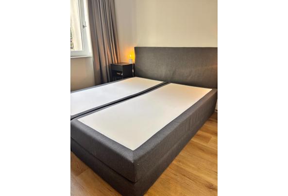 Twee persoons boxspring incl matrassen en hoofdbord - grijs - b08886a4-791f-4b6d-91cc-4605ce8020ff