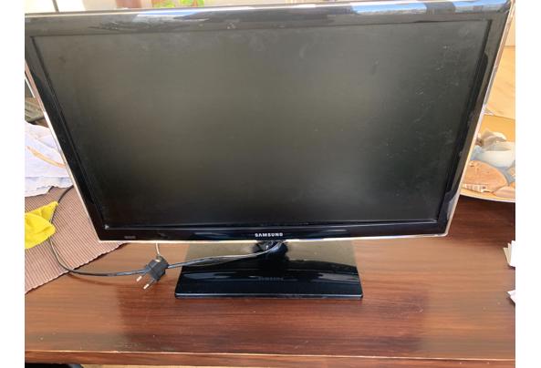 Computerscherm of klein tv’tje - 9A1A8D6A-BA9A-4819-B26B-36DA9310FBB5