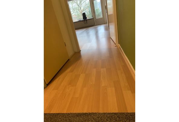 Laminaatvloer beuken 60 m2 plus een nieuw pak en plinten - IMG_6174