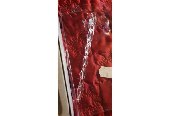 Diverse kerstspullen en kerstversieringen en kerstboom. - 20251107_131130