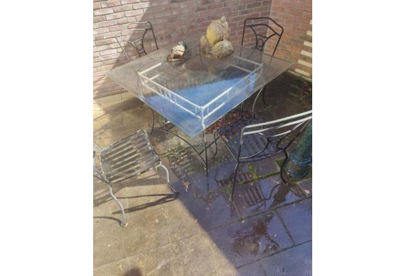 Gietijzeren glazen tafel met 4 stoelen - Screenshot_2026-07-04-15-01-27-30_c876520747fffd2e3f3cc79d2a2398f1
