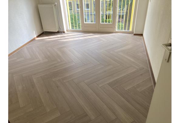 Visgraatlaminaat in zeer goede staat. ca. 70 m2; zelf eruit halen. - 1E1573F2-EAF8-4076-8ABD-0DD8D159B0A6