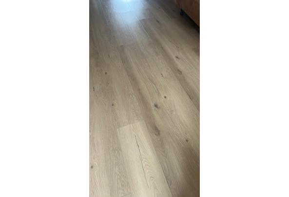Licht eikenhouten laminaat 45m2  - 1dc64b5f-ae70-4b5d-876f-dd3862dd69bb