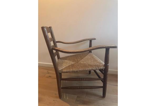 Comfortabele antieke vintage houten relax stoel rieten zitting - 721b8b00-fbb6-4824-af09-8ebf74ecd5ce