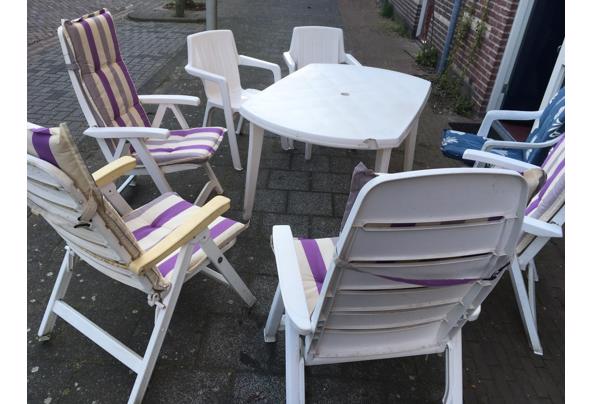 Comfortabele tuinset, ovale tafel  4 verstelbare stoele hoge rug met goede kussens en 3 stoelen lage rug - 735114B3-BD99-44D0-BF8B-71649472B079