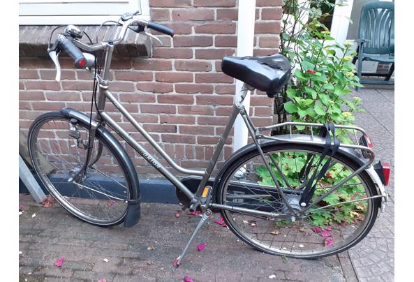 Hij is oud, met lekke band, maar valt op te lappen - 17810305601674213735098719091863