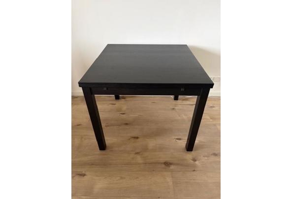 donkerbruine/zwarte uitschijfbare eettafel - tafel