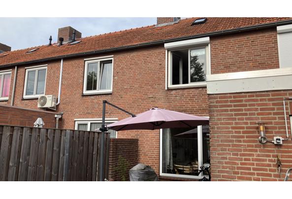 Parasol voor in de tuin  - BAD3E724-A004-41C4-8269-C3FED654C75D