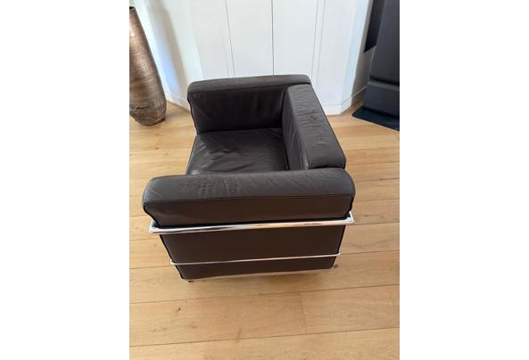 twee leren donderbruine stoelen met prachtig chromen frame.  - af7217a7-8546-47aa-b36c-1405c44a8e90