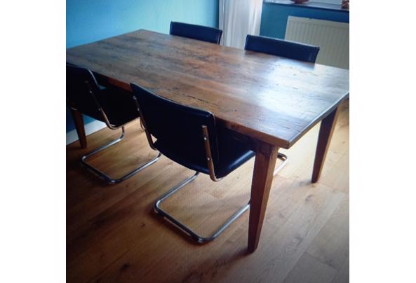 Ambachtelijk gemaakte tafel uit oude grenen vloerdelen - 17479214387196685990422021678403