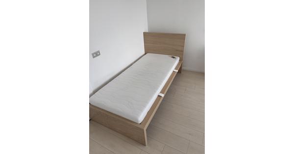 Eenpersoonsbed met matras