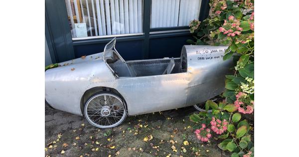 Zilverkleurige Ligfiets  - Opknapper